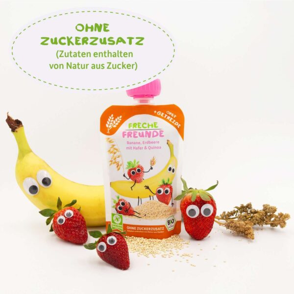 Freche Freunde Bio-Quetschie mit Banane, Erdbeere, Hafer & Quinoa. Drumherum echte Zutaten mit Kulleraugen – Hafer, Quinoakörner, Bananen und Erdbeeren. Text: „Ohne Zuckerzusatz – Zutaten enthalten von Natur aus Zucker“.