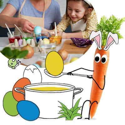 Kind am Eier natürlich färben mit Erwachsenem. Karl Karotte hilft und ist in Osterstimmung.