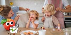 Freche Freunde - Blogbeitrag 10 Tipps fürs Kochen mit Kindern - 2 Kinder bekommen Schürzen angezogen