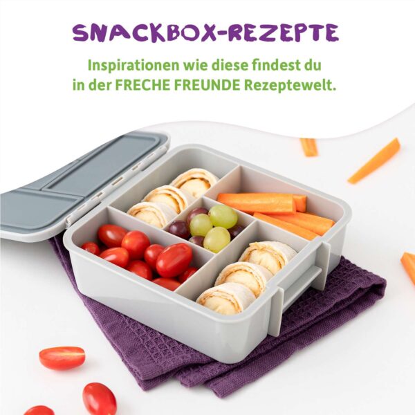 Gesunde Snackbox mit Wraps, Trauben, Tomaten und Karotten – Ideen aus der Freche-Freunde-Rezepwelt für Kinderpausen.