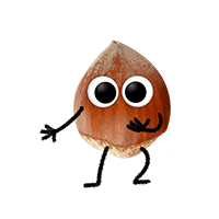 Eine Haselnuss mit Augen, Armen und Beinen.